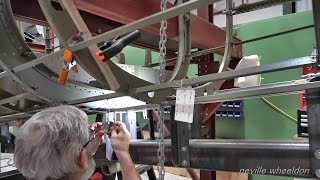 Video 250 restoration of Lancaster NX611 Year 7 . Phil and the Lancaster door frame