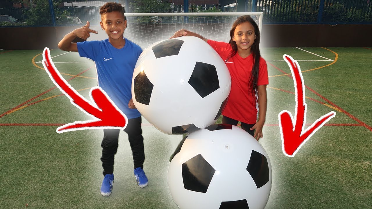 GIANT INFLATABLE FOOTBALL CHALLENGES!! Tash Baller vs Sister