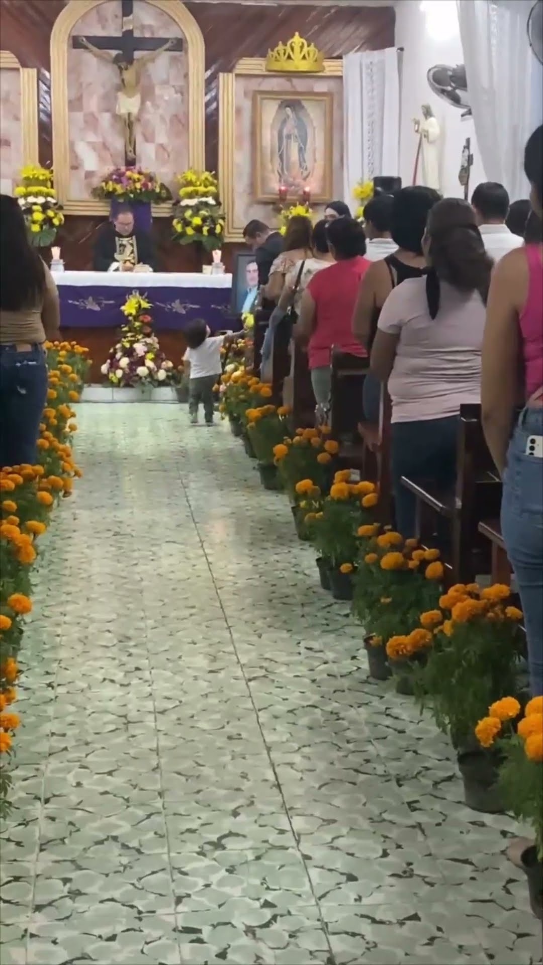 Adorable Boy Spreads Smiles and Handshakes During Church Service