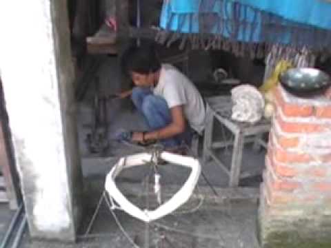 Purna Kumar Rai winding yarn onto a spool 1