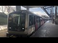 GVB M6 123/124 vertrekt met een tyfoon vanaf metrostation Noorderpark