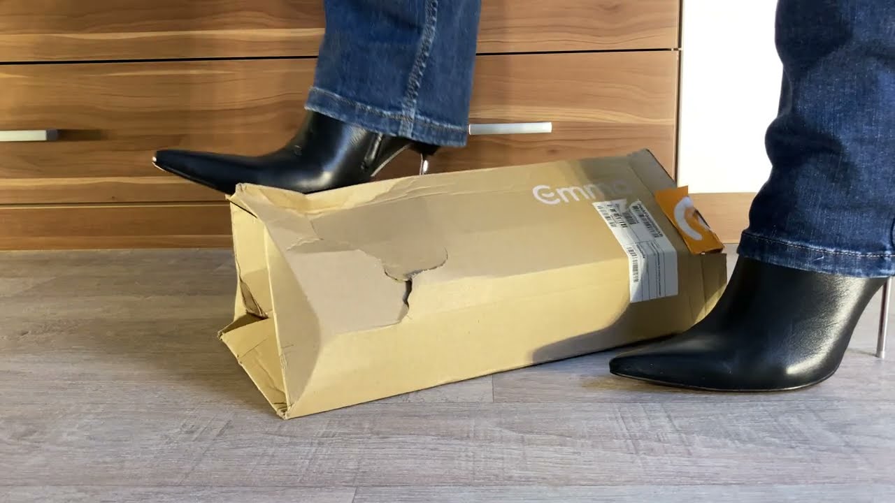 Boots crush cardboard --- metal heels