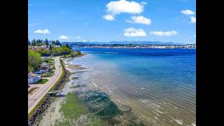 Debbie Lindsey and Kevin Adcock/ (RE/MAX Town Center) 1273 Beach Dr E, Port Orchard, WA 98366