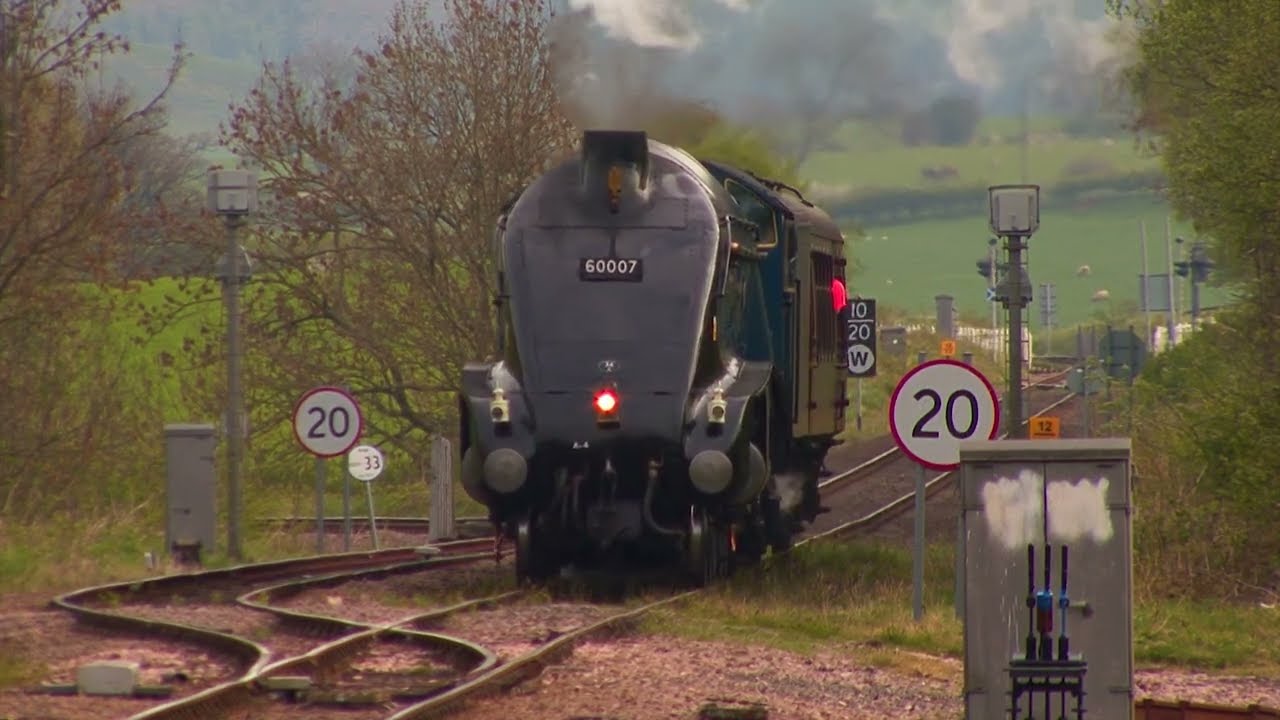 A4 No 60007 'Sir Nigel Gresley' with support coach arrives at Battersby