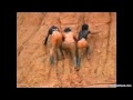 3 Thai girls in very sticky mud