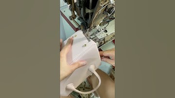 vào hông vào miệng chiếc túi dạng hộp màu vải hồng mới pat quai mới