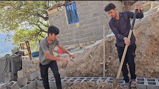 Nomadic life: Burhan's help to his brother Ali in building a house