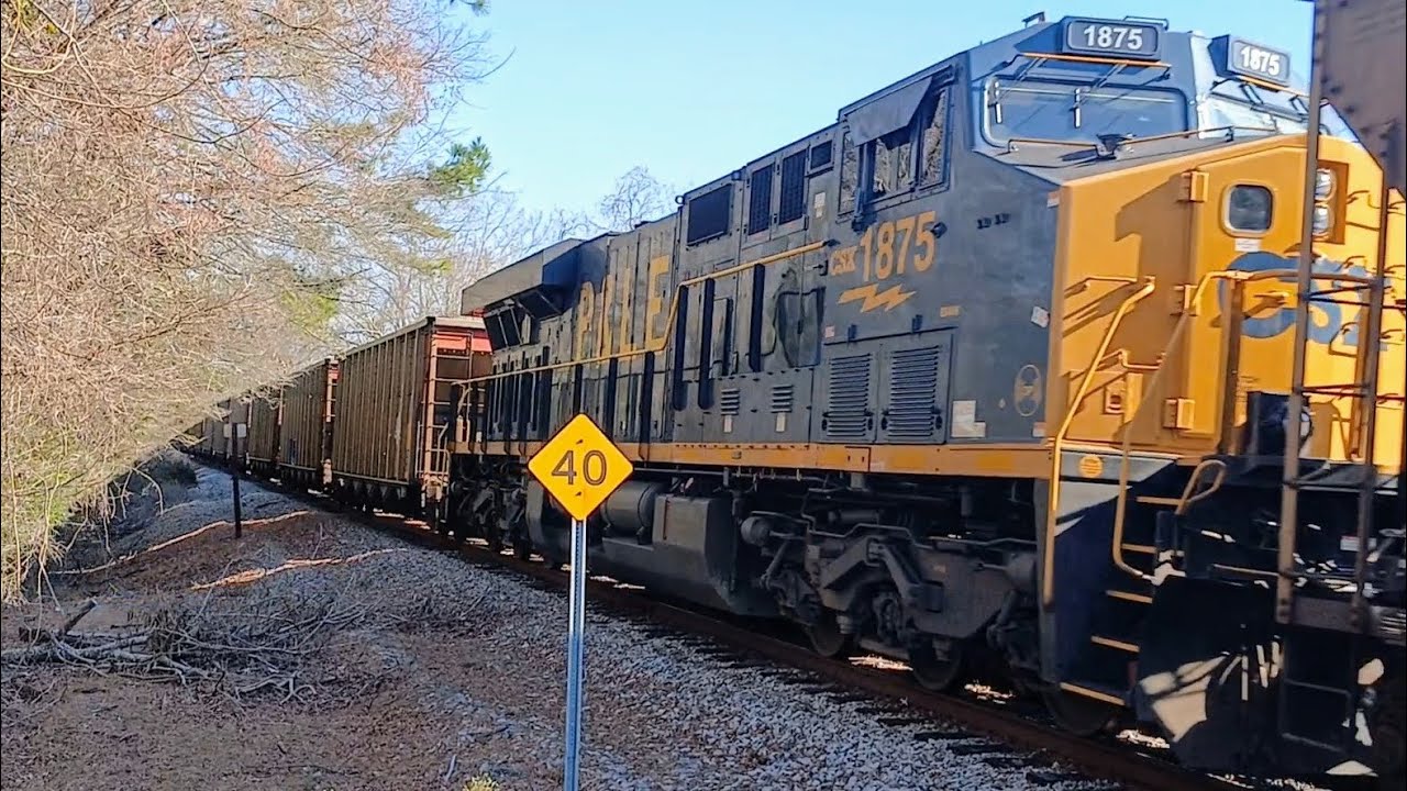 CSX R648 at South Beltline crossing Columbia SC with CSXT 1875 P&LE Heritage unit as DPU