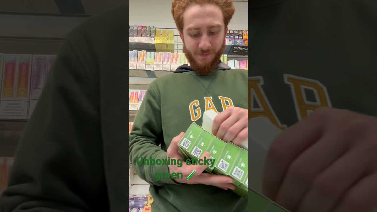 Unboxing sticky green disposable. 