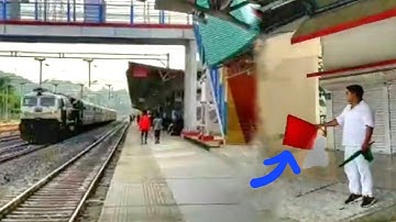 Showing Red Flag to Train Loco Pilot