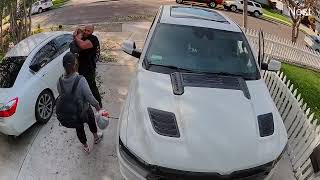 Guy opens passengers side door of Dodge Durango SUV and hits little boy on head (Security camera)