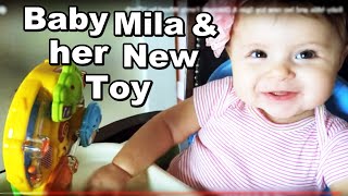Baby Mila and her New Toy Spin & Discover Ferris Wheel by VTech