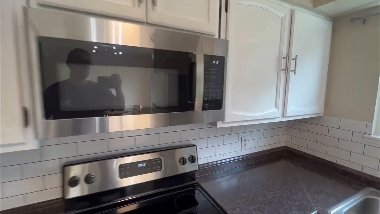 GE JVM3160DFCC 1.6 Cu Ft Over the Range Microwave Oven Bisque Bundle