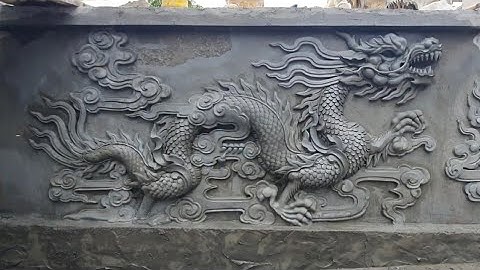 Đắp phù Điêu rồng . điêu khắc bức song long  trân châu. nghệ thuật điêu khắc bằng xi măng