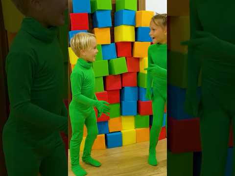 Chris plays in the invisibility cloak with his uncle