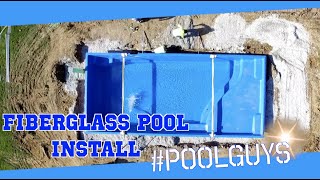 Setting a Fiberglass Pool into the Hole | #PoolGuys