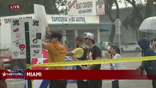 Small group defies rain at Versailles in Miami's Little Havana