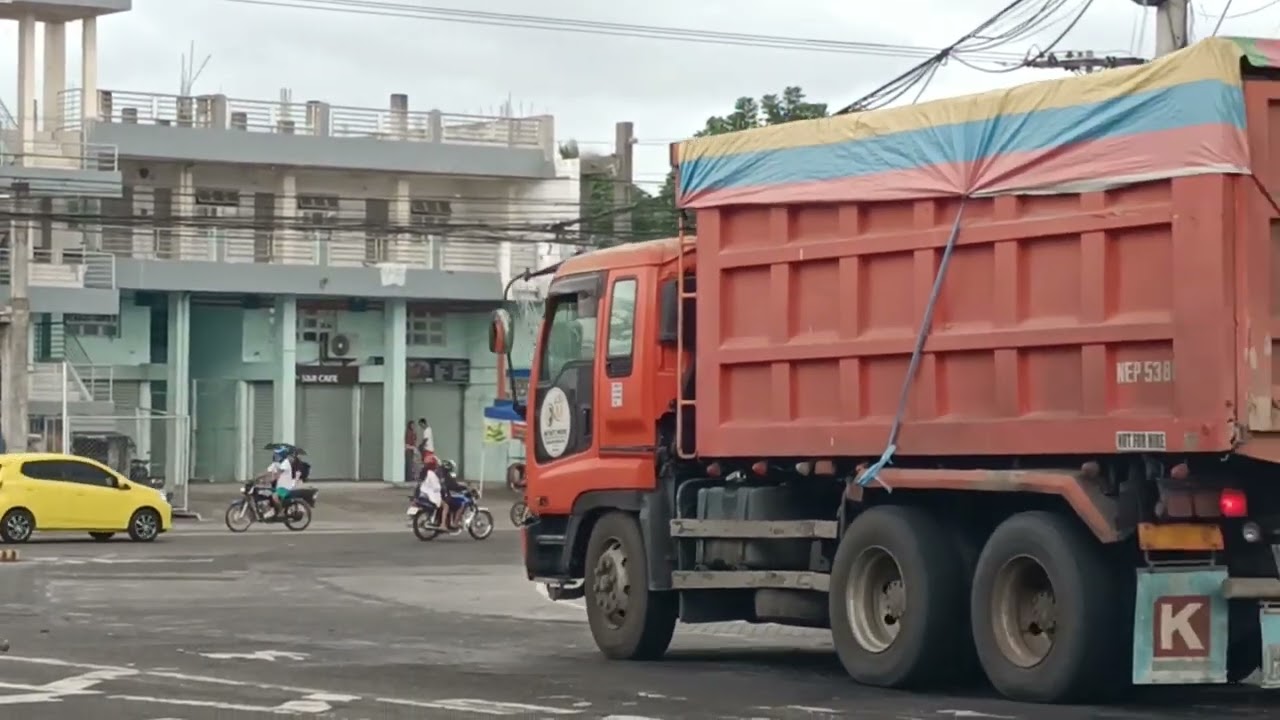THE DEPT. OF AGRICULTURE , AND WHILE WAITING AT BUS STOP