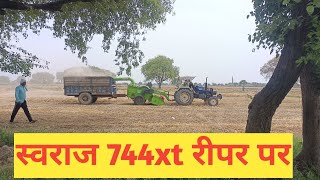 Swaraj 744xt on straw reaper 