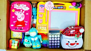 Unboxing modern stationery items - sketch pens, calculator pencil box, sketch board, santa PiggyBank