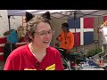100+ Volunteers Repaint Historic Flags in Northeast Kansas City
