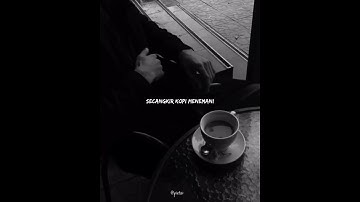 secangkir kopi dan sebatang rokok