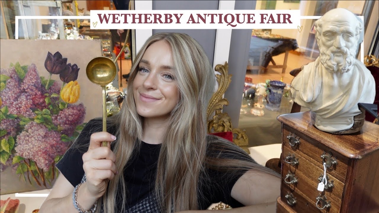 Покупка антиквариата на антикварной ярмарке на ипподроме Уэтерби.