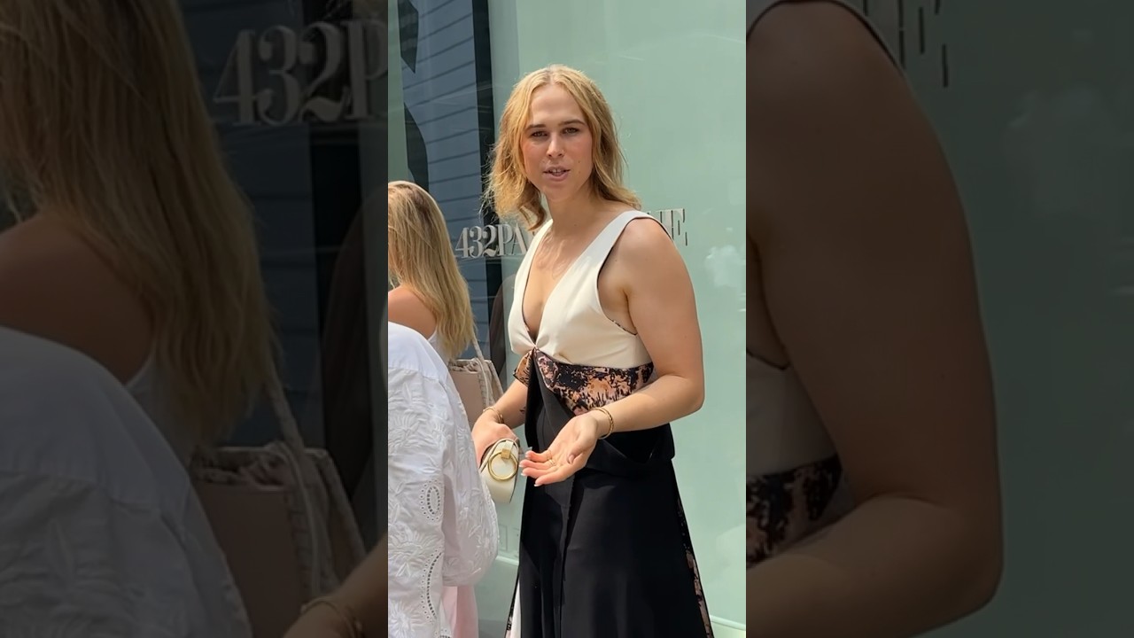 Tommy Dorfman dresses up at Alice + Olivia fashion show! 