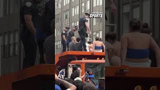 Knicks fans CLIMB TRUCKS to get into the parade! #shorts