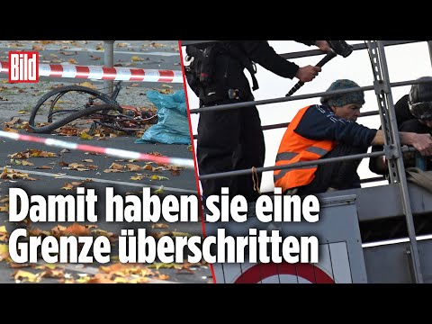 Video: Radfahrer baumelt von einer Brücke, nachdem ein Unfall eine Rennpause ankündigt