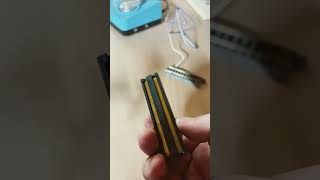 Cleaning the wheels with the Gaugemaster wheel cleaning brush