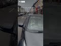 Dog honks owner's car horn after being left in the car