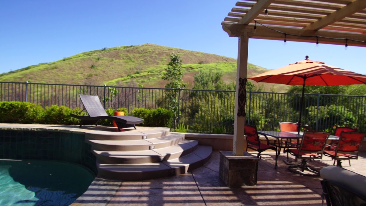 Woodridge Estates Pool Home Backs To Open Space with Stunning Views