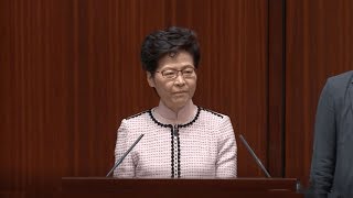 Lam's policy address speech halted as lawmakers disrupt session