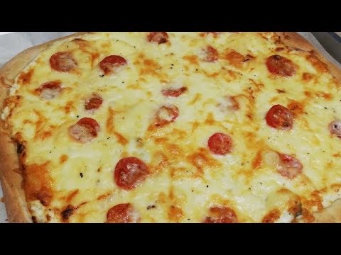 Vidéo: Comment Faire Une Pizza Avec Des Saucisses Et Des Cornichons