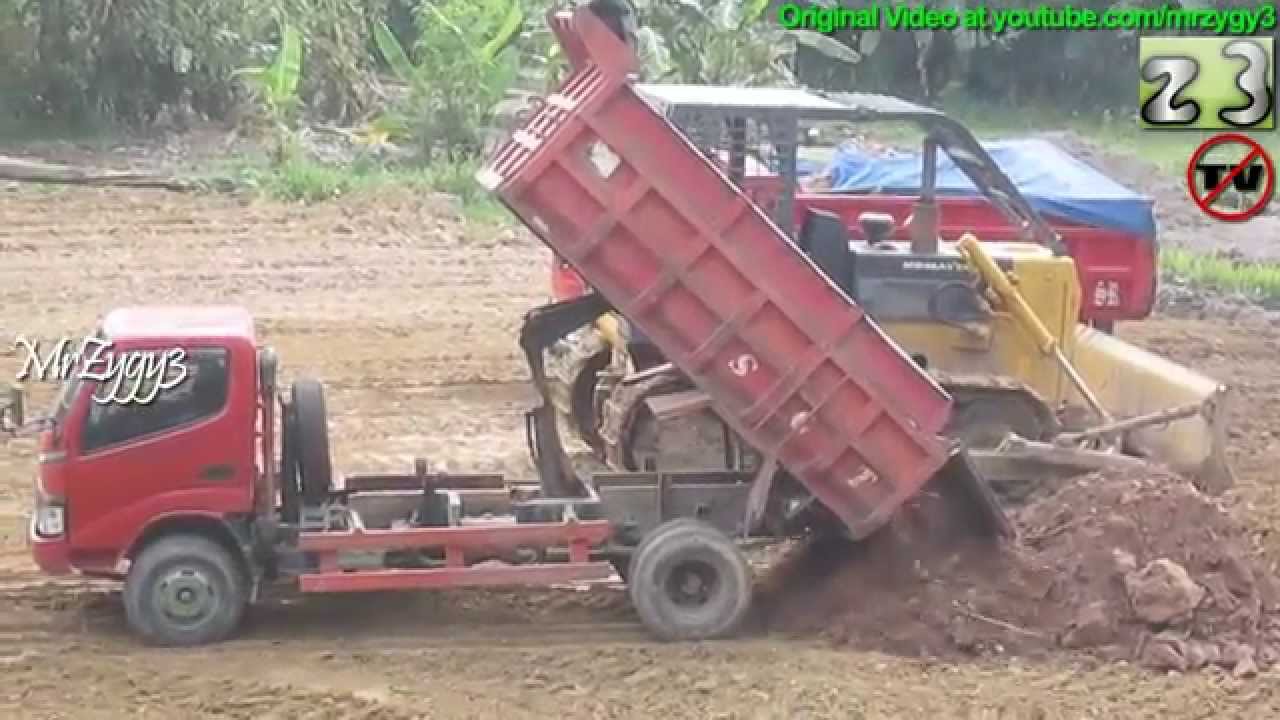 Toyota Dyna  Dump  Truck  Dumping Dirt At Construction Site 