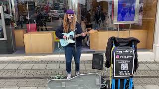 Brighton based guitar player & singer too! Meg Helstrip beautiful busking in Churchill Square.