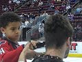 Cuts for Cancer:  BEARS players have heads shaved (by fans) proceeds benefit cancer research.