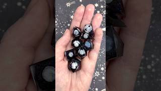 A handful of new planets 🪐✨ #dice #craft #handmade #art #gaming #ttrpg #dnd #resin #planet
