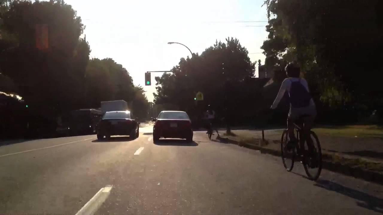 aggressive cyclists ignore red lights illegally pass