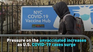 Pressure on the unvaccinated increases as U.S. COVID-19 cases surge