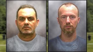 Police issue new image in search for escaped inmates