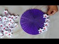 Quick and easy beautiful paper flower wall hanging idea. Diy. Home decor. Paper craft.