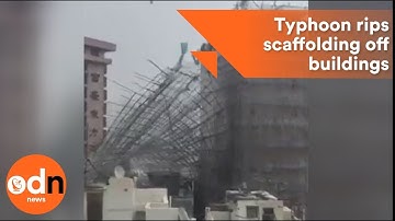 Typhoon rips scaffolding off buildings in Hong Kong