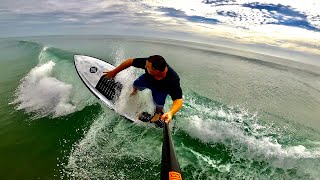 SUP Surf Session with dolphins at Ponce Inlet