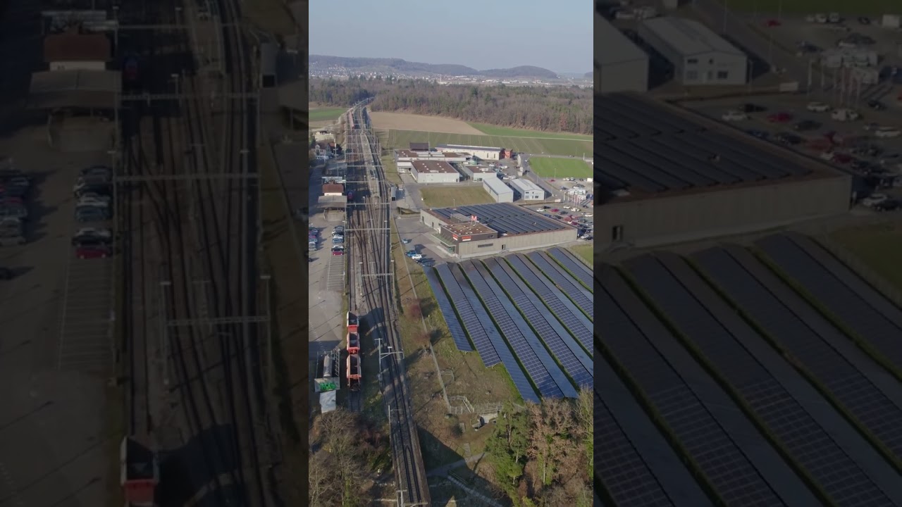 Eglisau railway bridge over Rhine River on a sunny summer day.