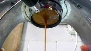 Presso extraction- concave tamper