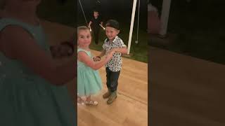Harper and Carson dancing first grade