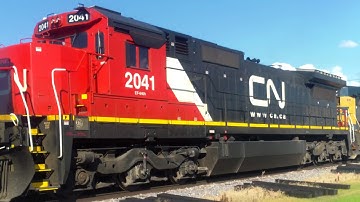 CSX 89 leads ex-CNW C40-8 on EB ethanol (CN U704)