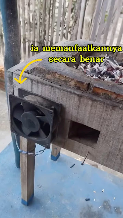 menggunakan kipas usang sebagai sumber tiupan